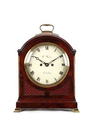 Lot JAMES WARREN, CANTERBURY. A GEORGE III FIGURED MAHOGANY PAD TOP VERGE BRACKET CLOCK