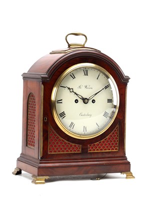 Lot JAMES WARREN, CANTERBURY. A GEORGE III FIGURED MAHOGANY PAD TOP VERGE BRACKET CLOCK