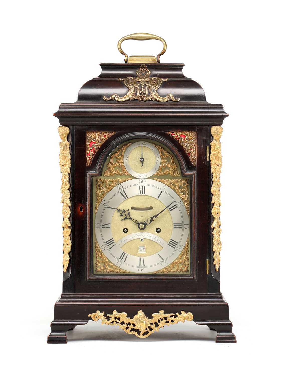 Lot THOMAS HUNTER JR., LONDON. A GEORGE III ORMOLU MOUNTED EBONISED VERGE STRIKING BRACKET CLOCK