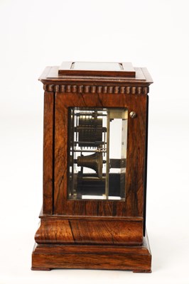 Lot JOHN MOORE & SONS, LONDON. A LATE REGENCY ROSEWOOD FOUR-GLASS FUSEE LIBRARY CLOCK