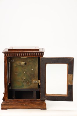 Lot JOHN MOORE & SONS, LONDON. A LATE REGENCY ROSEWOOD FOUR-GLASS FUSEE LIBRARY CLOCK