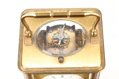 Lot A LATE 19TH CENTURY FRENCH GILT BRASS REPEATING CARRIAGE CLOCK WITH ALARM