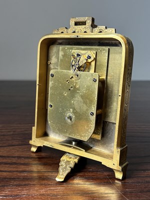 Lot ATT. THOMAS COLE, LONDON A MID 19TH CENTURY GILT BRASS ENGRAVED STRUT CLOCK RETAILED BY C.F. HANCOCK, LONDON