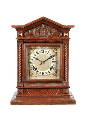Lot A LATE 19TH CENTURY GERMAN JUNGHANS CARVED OAK CUCKOO BRACKET CLOCK