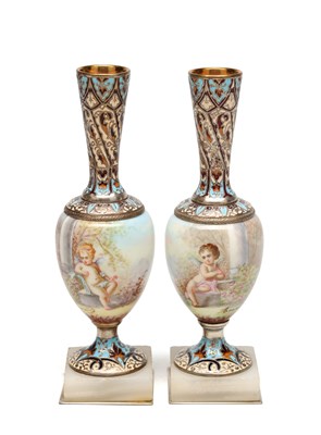 Lot ARMAND A PAIR OF 20TH CENTURY FRENCH CHAMPLEVE AND ENAMEL VASES ON ONYX BASES