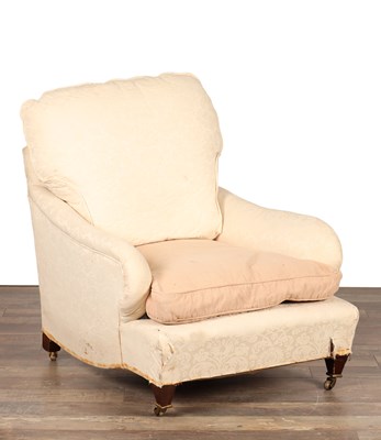 Lot AN EARLY 20TH CENTURY HOWARD STYLE UPHOLSTERED ARMCHAIR