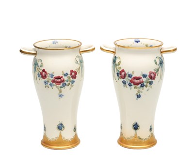 Lot WILLIAM MOORCROFT FOR JAMES MACINTYRE AND CO A PAIR OF EARTHENWARE HANDLED VASES