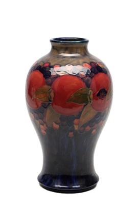 Lot A LARGE 20TH CENTURY MOORCROFT POTTERY POMEGRANATE AND BERRIES VASE