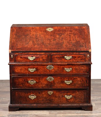 Lot AN EARLY 18TH CENTURY ENGLISH BURR WALNUT BUREAU