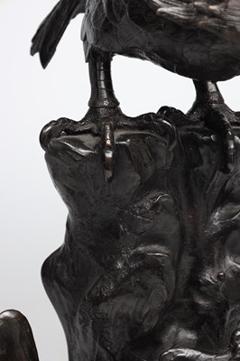 Lot A JAPANESE MEIJI PERIOD PATINATED BRONZE EAGLE ON ROCKY BASE