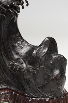 Lot A JAPANESE MEIJI PERIOD PATINATED BRONZE EAGLE ON ROCKY BASE
