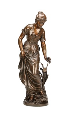 Lot SYLVAIN KINSBURGER (FRENCH 1855-1935) A PATINATED BRONZE FIGURE OF A YOUNG WOMAN WITH A FLOWER