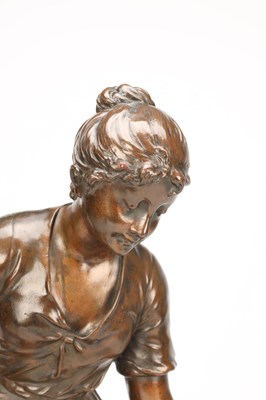 Lot SYLVAIN KINSBURGER (FRENCH 1855-1935) A PATINATED BRONZE FIGURE OF A YOUNG WOMAN WITH A FLOWER
