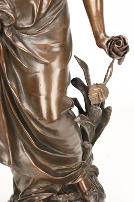 Lot SYLVAIN KINSBURGER (FRENCH 1855-1935) A PATINATED BRONZE FIGURE OF A YOUNG WOMAN WITH A FLOWER