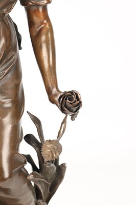 Lot SYLVAIN KINSBURGER (FRENCH 1855-1935) A PATINATED BRONZE FIGURE OF A YOUNG WOMAN WITH A FLOWER