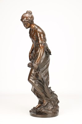 Lot SYLVAIN KINSBURGER (FRENCH 1855-1935) A PATINATED BRONZE FIGURE OF A YOUNG WOMAN WITH A FLOWER