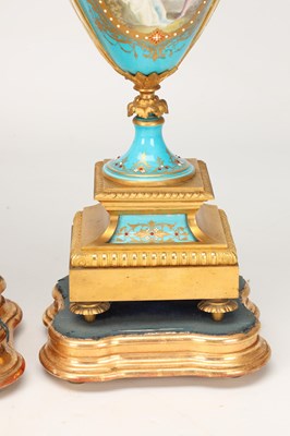 Lot 155 - A LARGE LATE 19TH CENTURY FRENCH SEVRES JEWELLED PORCELAIN AND ORMOLU TURQUOISE-GROUND CLOCK GARNITURE