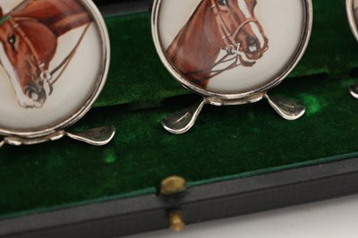Lot A CASED SET OF EDWARDIAN ENGLISH SILVER MENU HOLDERS WITH HAND PAINTED HORSE PORTRAITS
