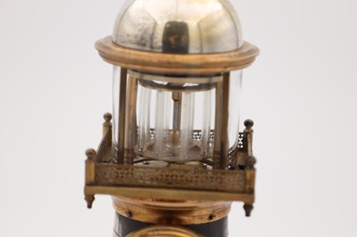 Lot 126 - GUILMET, PARIS. A LATE 19TH CENTURY BRASS AND SILVERED BRASS AUTOMATON LIGHTHOUSE MANTEL CLOCK