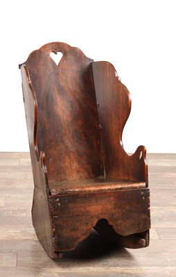 Lot AN 18TH CENTURY MAHOGNAY AND OAK CHILD'S ROCKING CHAIR WITH HEART-PIERCED CRESTING