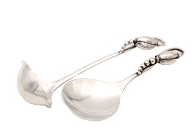 Lot TWO EARLY 20TH CENTURY GEORG JENSEN SILVER SPOONS MAGNOLIA PATTERN