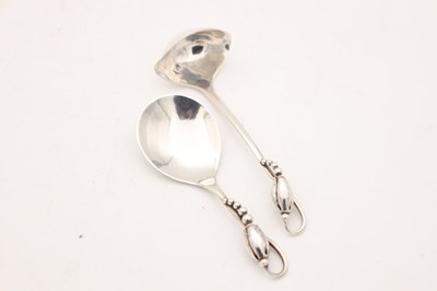 Lot TWO EARLY 20TH CENTURY GEORG JENSEN SILVER SPOONS MAGNOLIA PATTERN