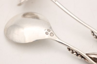 Lot TWO EARLY 20TH CENTURY GEORG JENSEN SILVER SPOONS MAGNOLIA PATTERN