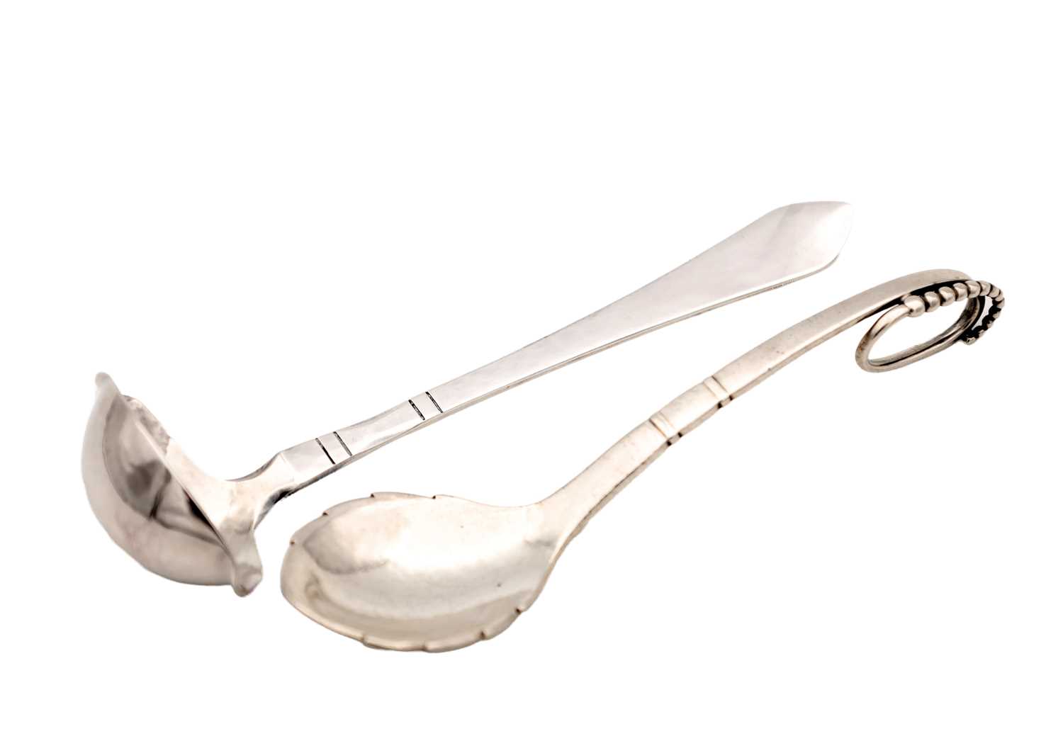 Lot TWO 20TH CENTURY DANISH SILVER SPOONS BY GEORG JENSEN