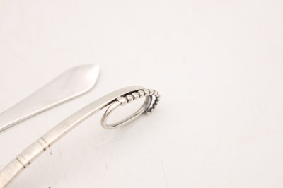 Lot TWO 20TH CENTURY DANISH SILVER SPOONS BY GEORG JENSEN