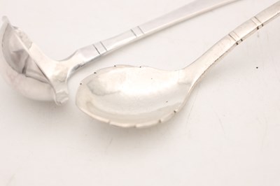 Lot TWO 20TH CENTURY DANISH SILVER SPOONS BY GEORG JENSEN