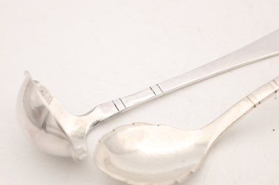 Lot TWO 20TH CENTURY DANISH SILVER SPOONS BY GEORG JENSEN