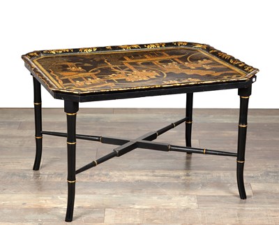 Lot AN 18TH CENTURY CHINOISERIE DECORATED LACQUERWORK TRAY ON A LATER STAND