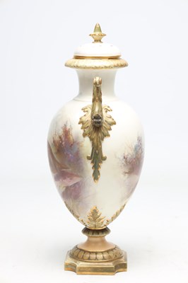 Lot AN EDWARDIAN ROYAL CHINA WORKS WORCESTER PORCELAIN TWO-HANDLED PEDESTAL VASE AND COVER