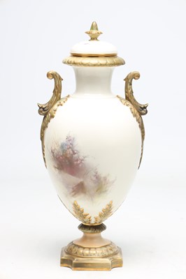Lot AN EDWARDIAN ROYAL CHINA WORKS WORCESTER PORCELAIN TWO-HANDLED PEDESTAL VASE AND COVER