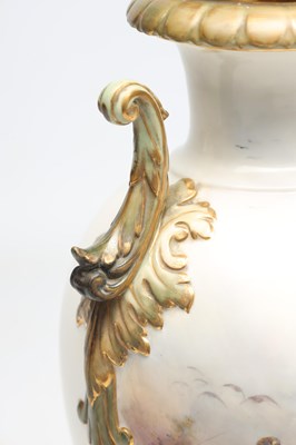 Lot AN EDWARDIAN ROYAL CHINA WORKS WORCESTER PORCELAIN TWO-HANDLED PEDESTAL VASE AND COVER