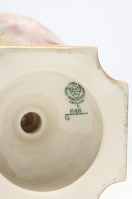 Lot AN EDWARDIAN ROYAL CHINA WORKS WORCESTER PORCELAIN TWO-HANDLED PEDESTAL VASE AND COVER