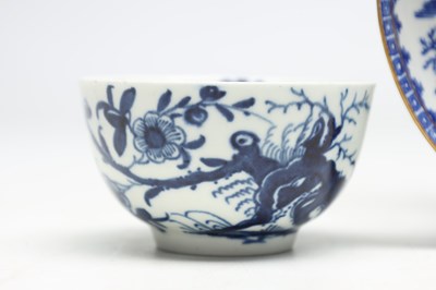 Lot THREE FIRST PERIOD WORCESTER BLUE AND WHITE PORCELAIN TEABOWLS AND A DISH