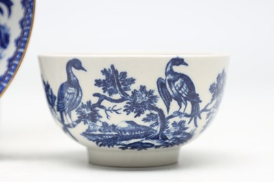 Lot THREE FIRST PERIOD WORCESTER BLUE AND WHITE PORCELAIN TEABOWLS AND A DISH