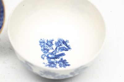 Lot THREE FIRST PERIOD WORCESTER BLUE AND WHITE PORCELAIN TEABOWLS AND A DISH