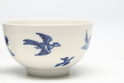 Lot THREE FIRST PERIOD WORCESTER BLUE AND WHITE PORCELAIN TEABOWLS AND A DISH