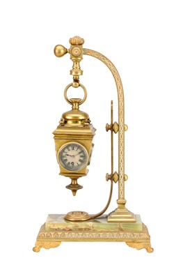 Lot 5 - AN UNUSUAL LATE 19TH CENTURY FRENCH BRASS AND ONYX NOVELTY MANTEL CLOCK