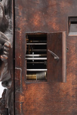 Lot 117 - A 19TH CENTURY BLACK FOREST CARVED WALNUT DOUBLE FUSEE CUCKOO CLOCK