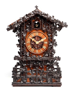 Lot 95 - A GOOD 19TH CENTURY BLACK FOREST CARVED WALNUT DOUBLE FUSEE CUCKOO CLOCK