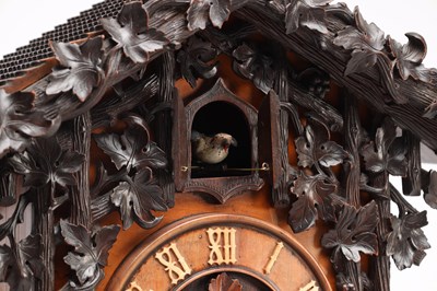 Lot 95 - A GOOD 19TH CENTURY BLACK FOREST CARVED WALNUT DOUBLE FUSEE CUCKOO CLOCK