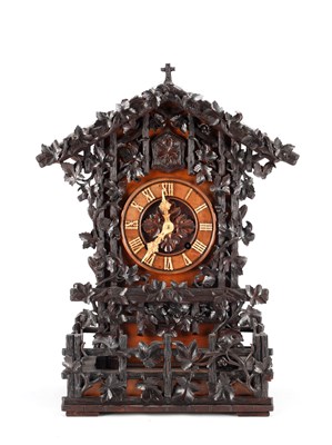 Lot 95 - A GOOD 19TH CENTURY BLACK FOREST CARVED WALNUT DOUBLE FUSEE CUCKOO CLOCK