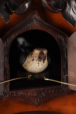Lot 95 - A GOOD 19TH CENTURY BLACK FOREST CARVED WALNUT DOUBLE FUSEE CUCKOO CLOCK