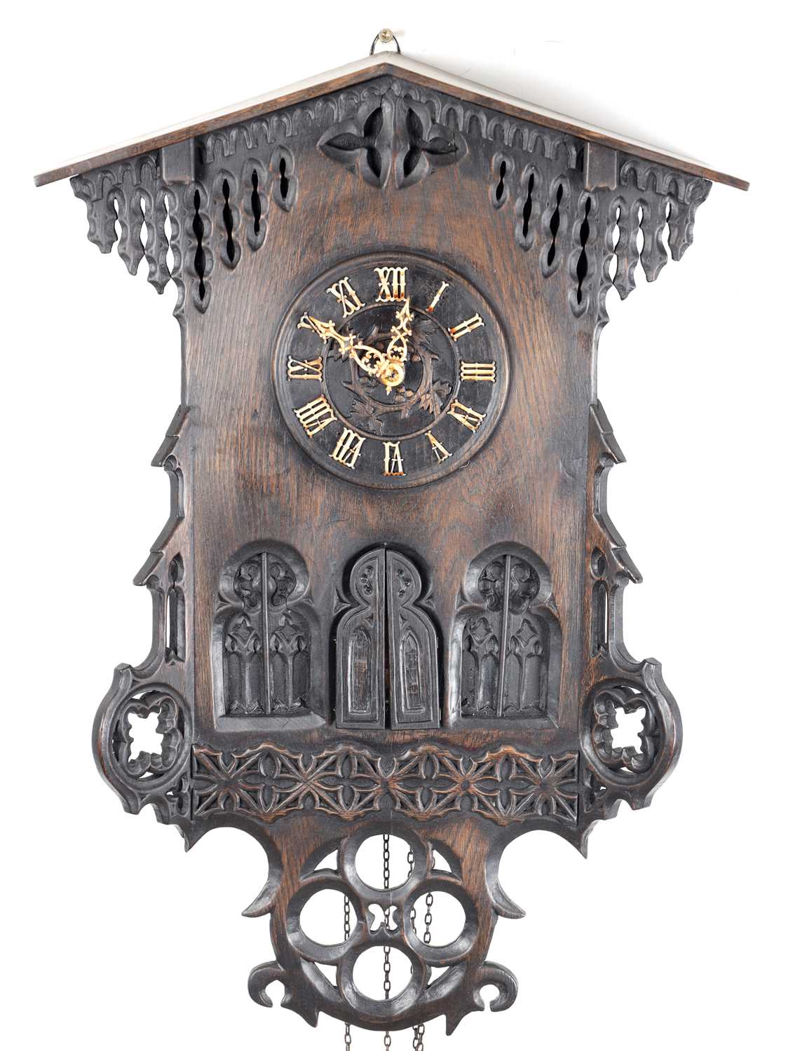 Lot 60 - AN UNUSUAL 19TH CENTURY AND LATER CARVED OAK BLACK FOREST FLUTE PLAYER CUCKOO CLOCK