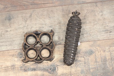 Lot 60 - AN UNUSUAL 19TH CENTURY AND LATER CARVED OAK BLACK FOREST FLUTE PLAYER CUCKOO CLOCK