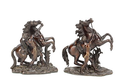 Lot AFTER GUILLAUME COUSTOU A PAIR OF PATINATED BRONZE MARLY HORSES