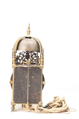 Lot 77 - NICHOLAS COXETER, LONDINI. A MID 17TH CENTURY BRASS VERGE LANTERN CLOCK
